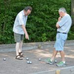 Petanque discussion over balls