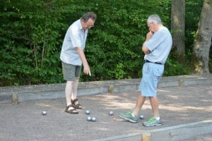 petanque discussion over balls